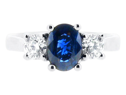 Oval Blue Sapphire and Round Brilliants Engagement Ring