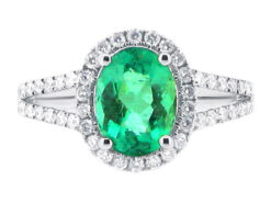 Oval Halo with Scallop Set Split Shank and Green Emerald Centre Stone