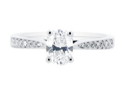 Oval Cut Diamond Solitaire with Tapered Pave Set Shoulders