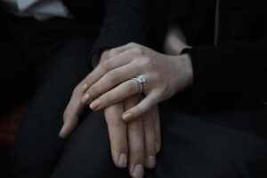 Sophie Turner is wearing an engagement ring on her hand.
